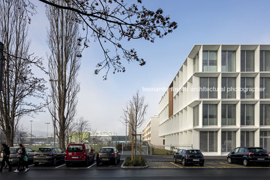 emmi-main office and apartment complex rüssli architekten