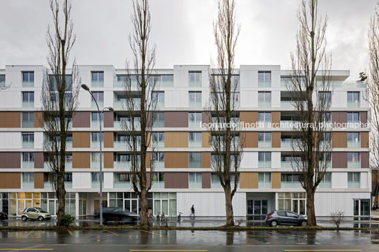 emmi-main office and apartment complex rüssli architekten